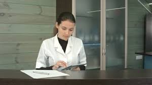 Salon owner using tablet